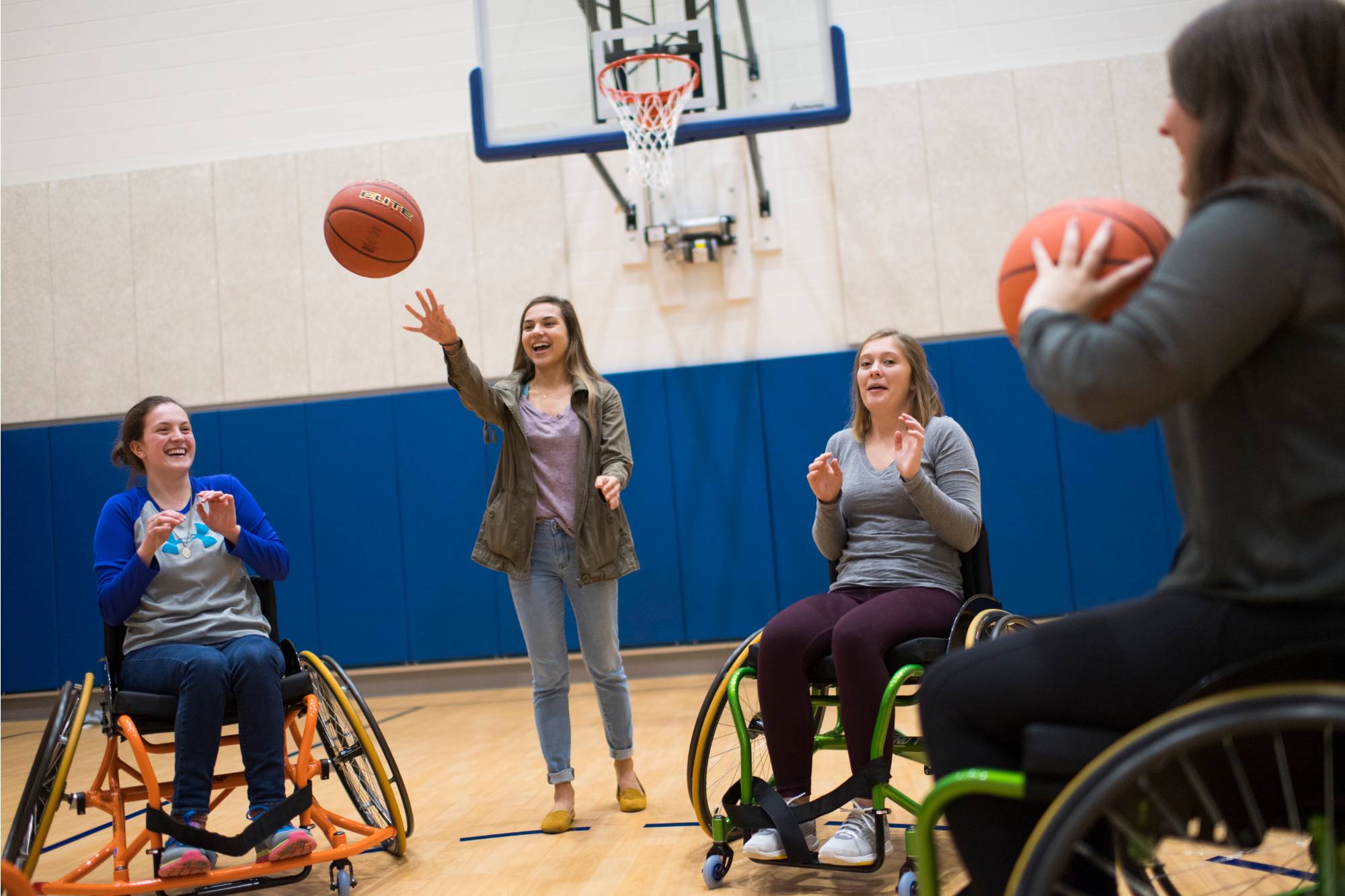 4 GVSU women playing wheelchair basketball